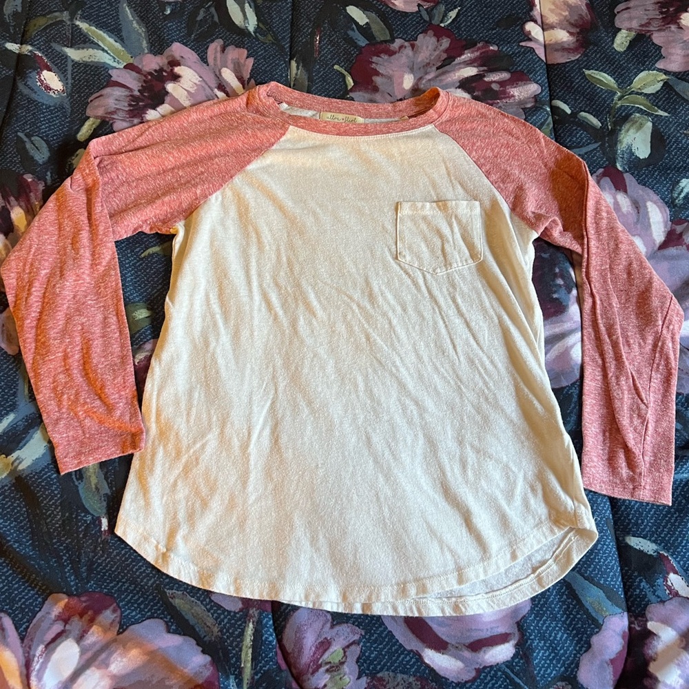 Ultra Flirt small pink and cream white baseball tee. Used but good condition.